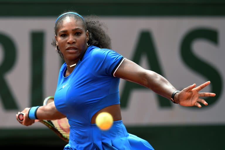 Serena Williams returns the ball to Kristina Mladenovic during their women's third round match at the French Open in Paris on May 28, 2016