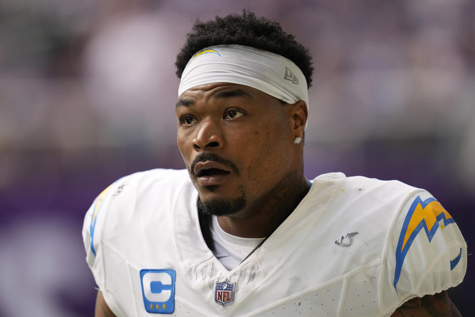 FILE - Los Angeles Chargers safety Derwin James Jr. walks on the field before the start of the second half of an NFL football game against the Minnesota Vikings, Sept. 24, 2023, in Minneapolis. James has been called for three unnecessary roughness penalties in the four games he has played. (AP Photo/Abbie Parr, File)