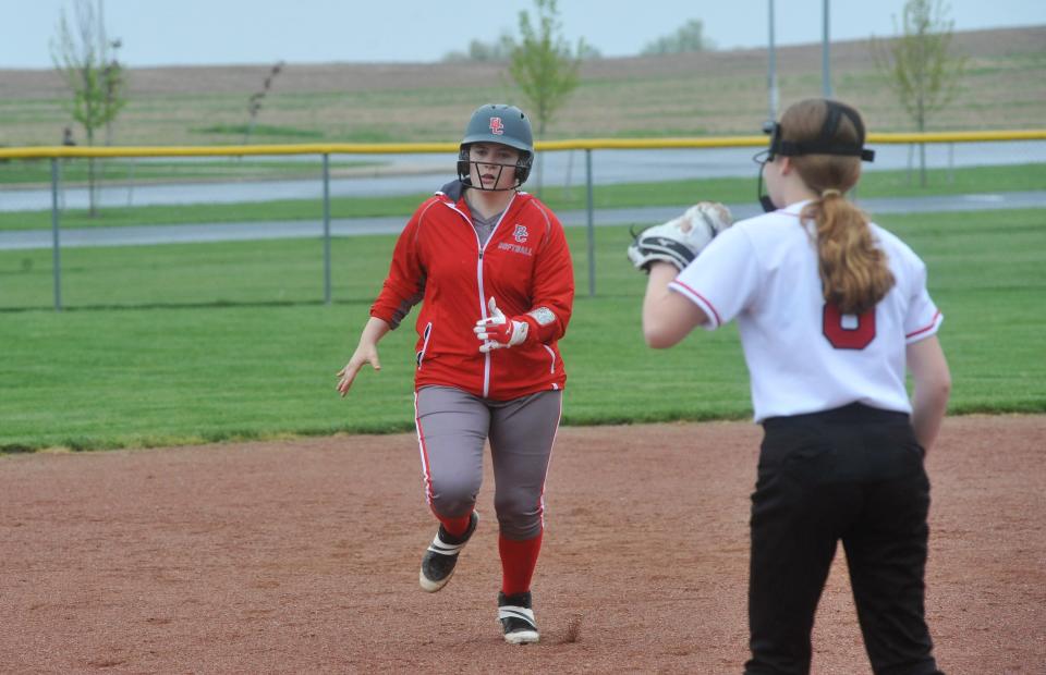 Buckeye Central's Kaitlyn Best sprints toward third base after a throwing error.