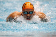 INDIANAPOLIS, IN - MARCH 29: Ariana Kukors swims in the women's 100 meter butterfly finals during day one of the 2012 Indianapolis Grand Prix at the Indiana University Natatorium on March 29, 2012 in Indianapolis, Indiana. (Photo by Dilip Vishwanat/Getty Images)