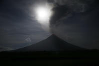 <p>The moon exhibits a phenomena that combined a supermoon, a blue moon and a total lunar eclipse as seen in Legazpi city, Albay province around 200 miles (340 kilometers) southeast of Manila, Philippines Wednesday, Jan. 31, 2018. (Photo: Bullit Marquez/AP) </p>