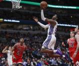 Dec 10, 2018; Chicago, IL, USA; Sacramento Kings guard De'Aaron Fox (5) goes to the basket against the Chicago Bulls during the second half at United Center. Kamil Krzaczynski-USA TODAY Sports