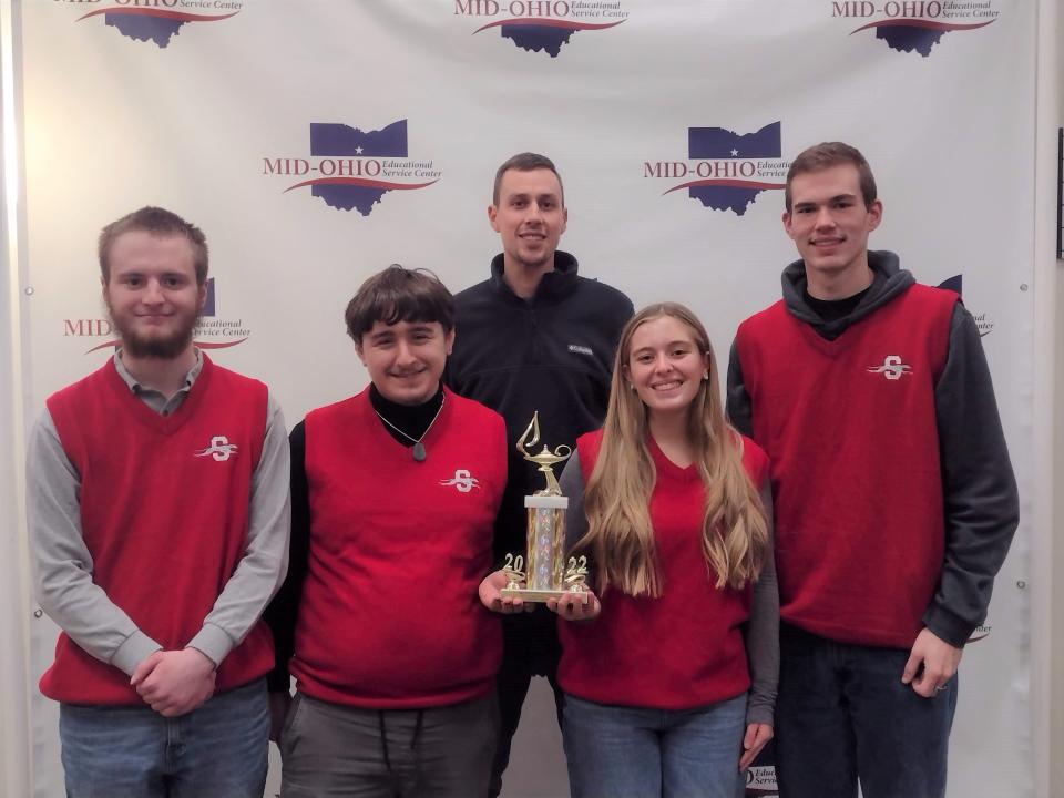 Shelby, winner of Bracket A, took runner-up overall in the Academic Challenge Fall Tournament. Team members were, from left,  Cole Jenkins, Sam Alonzo, Alexis McClain and Case Mongold with coach Grayson Murray in back row.