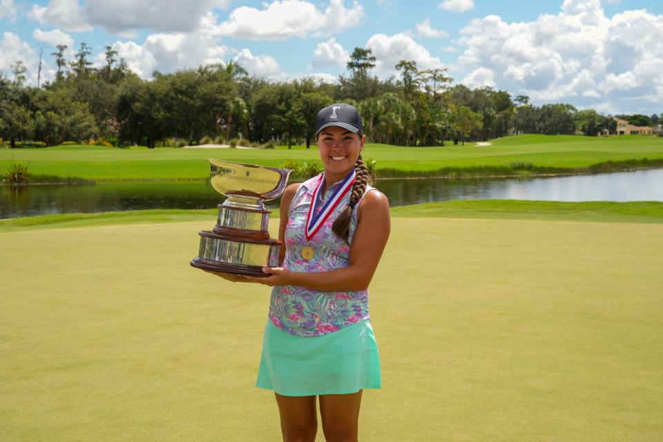 Krissy Carman holds the trophy after winning the 2022 U.S. Women's Mid-Amateur at Fiddlesticks Country Club (Long Mean Course) in Fort Myers on Thursday, Sept. 22, 2022.