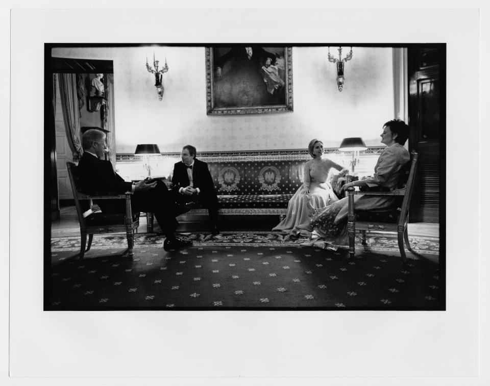 The Clintons, with British Prime Minister Tony Blair and Cherie Blair, rest after a receiving line before a state dinner. February 5,1998.