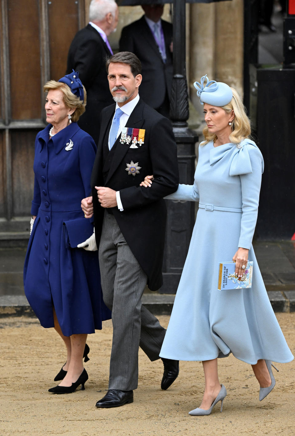 LONDON, ENGLAND - MAY 06:  Queen Anne-Marie of Greece, Crown Prince Pavlos of Greece and Marie-Chantal, Crown Princess of Greece arrive to attend the Coronation of King Charles III and Queen Camilla on May 6, 2023 in London, England. The Coronation of Charles III and his wife, Camilla, as King and Queen of the United Kingdom of Great Britain and Northern Ireland, and the other Commonwealth realms takes place at Westminster Abbey today. Charles acceded to the throne on 8 September 2022, upon the death of his mother, Elizabeth II. (Photo by Toby Melville - WPA Pool/Getty Images)