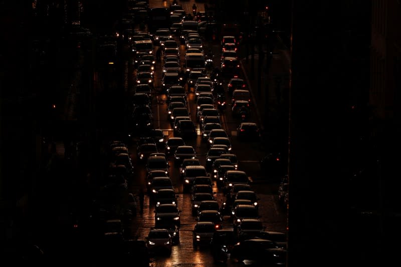 Cars are seen in a traffic jam in Rome