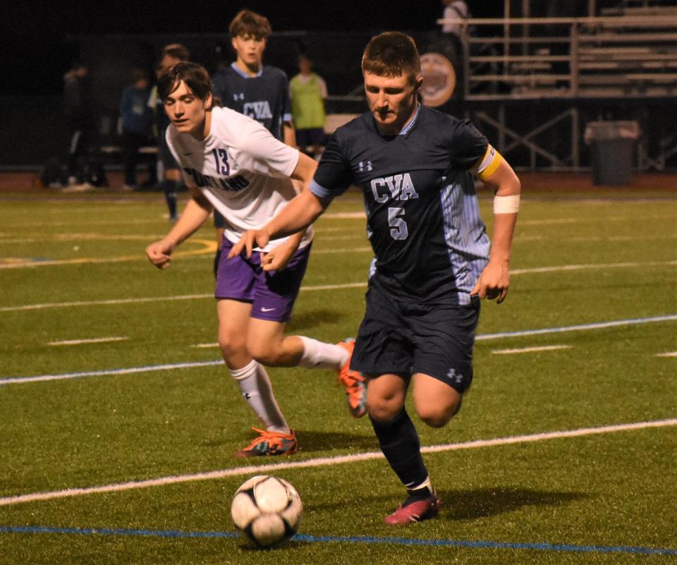 Cooper Reed (5) broke a tie for a Central Valley Academy record by scoring his 37th career goal against Cortland during the second half of Tuesday's Section III playoff match.