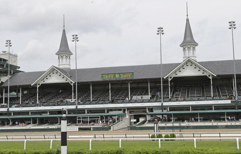 FILE - A general view of the twin spires at Churchill Downs is seen Wednesday, May 1, 2019, in Louisville, Ky. Tiz the Law is the 3-5 morning-line favorite for the 146th Kentucky Derby and will attempt to become the first winner from the No. 17 post position drawn for Saturday's rescheduled marquee race for 3-year-olds. (AP Photo/Gregory Payan, File)