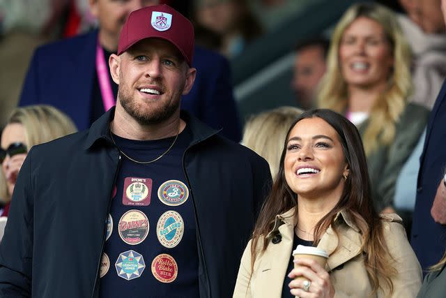 <p>Martin Rickett/PA Images via Getty</p> JJ Watt and Kealia Watt applaud from the stands during the Sky Bet Championship match at Turf Moor, Burnley. Picture date: Monday May 8, 2023