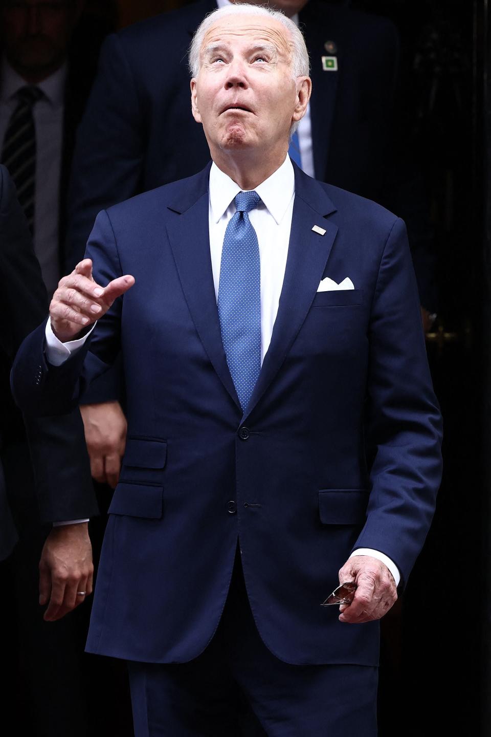 US President Joe Biden reacts as he leaves from 10 Downing Street (AFP via Getty Images)