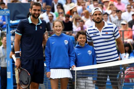 Tennis - Aegon Championships - Queen’s Club, London, Britain - June 25, 2017 Marin Cilic (L) and Feliciano Lopez (R) pose for a photograph before the final Action Images via Reuters/Tony O'Brien