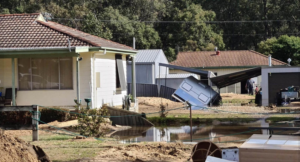 A caravan fallen into the ground