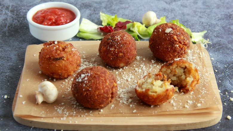 Arancini on wood board