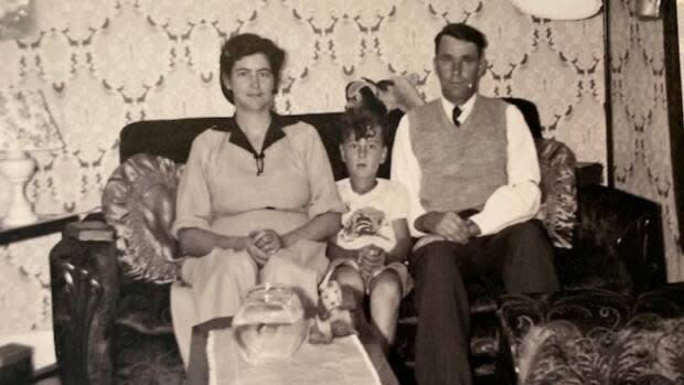 Pearl Crewe, her son Jim and her husband Herbert are pictured at their home in Corner Brook, circa 1953.