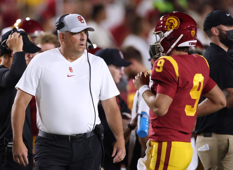 Coach Clay Helton and the Trojans suffered a blowout loss against Stanford on Saturday.