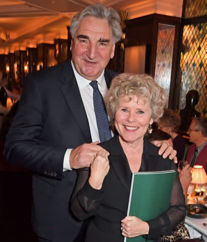 <p>Dave Benett/Getty</p> Jim Carter and Imelda Staunton on Dec. 1, 2019