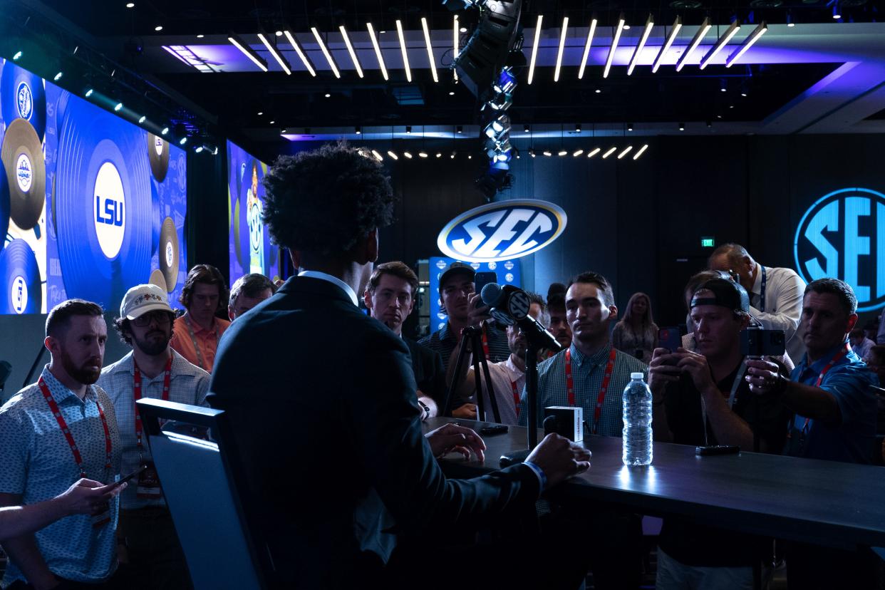 LSU's Jayden Daniels fields questions at SEC media days on Monday in Nashville, Tenn. The Tigers look poised for a run at the SEC title game. Media days run through Thursday.