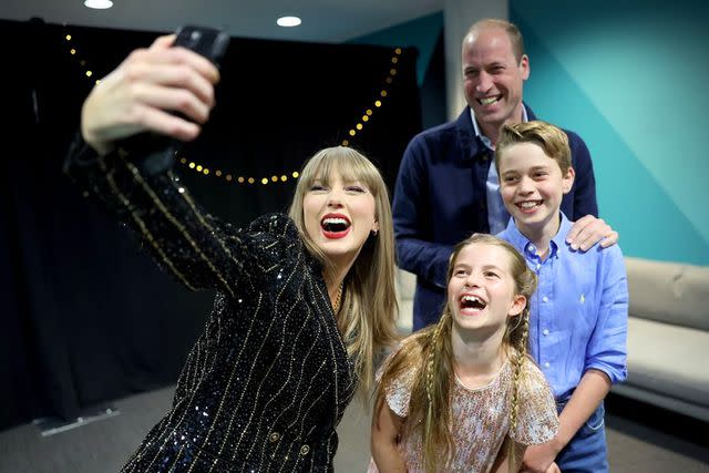 <p>Prince and Princess of Wales/Instagram</p> Taylor Swift poses for a photo with Prince William, Princess Charlotte and Prince George.