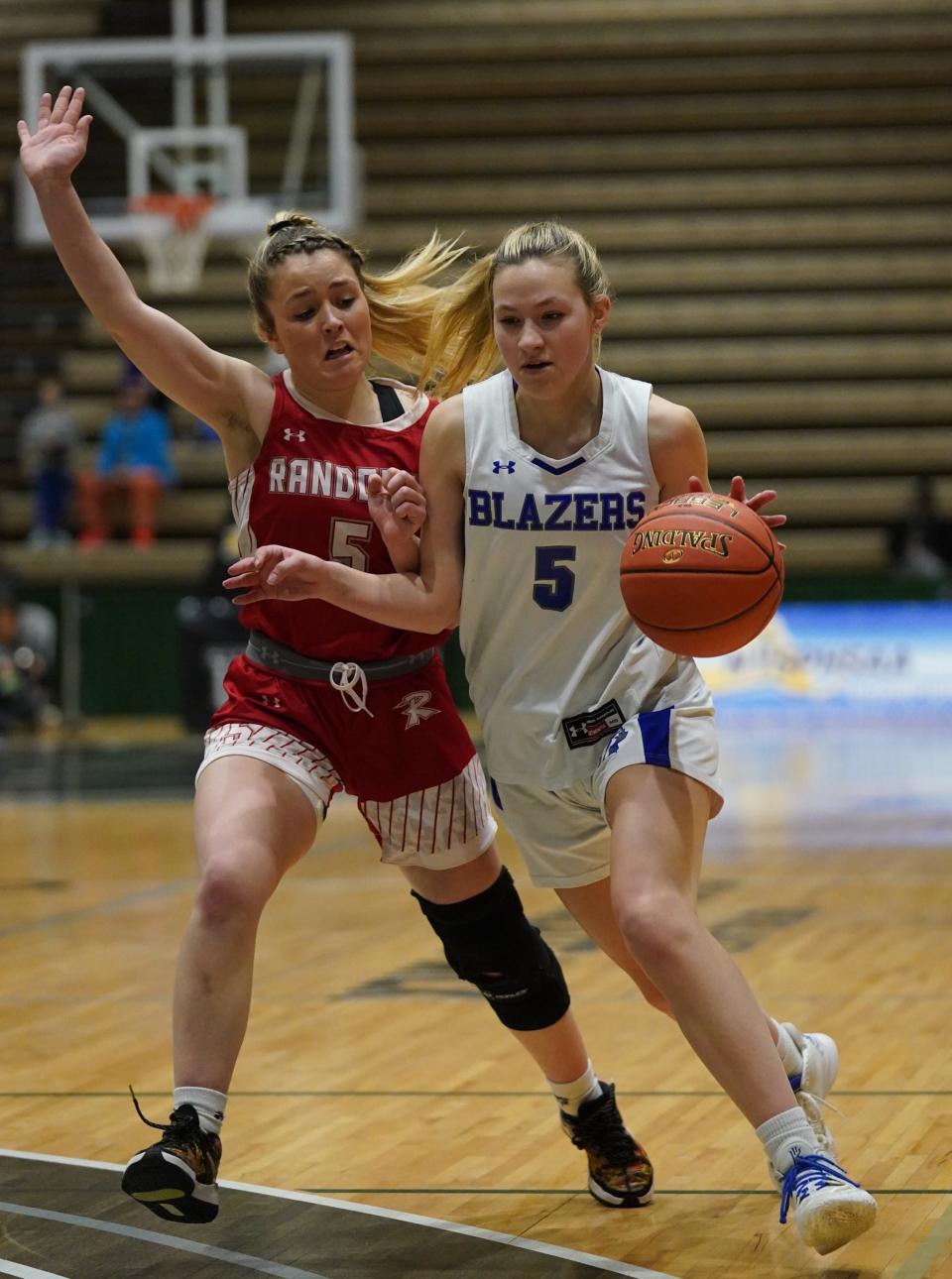 Millbrook's Beth Bosan (5) drives to the paint during their 59-45 win over Randolph in the girls NYSPHSAA Class C championship game at Hudson Valley Community College in Troy, on Sunday, March 19, 2023.