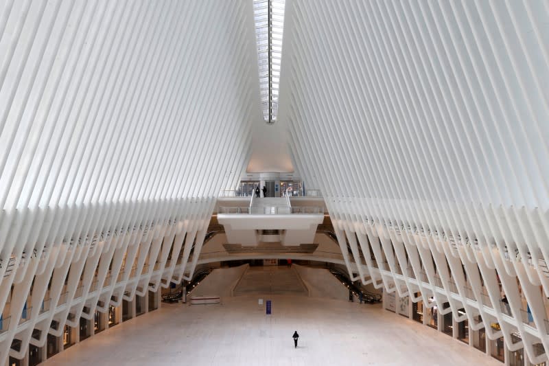 Man walks alone through Oculus transportation hub during outbreak of the coronavirus disease (COVID-19) in New York