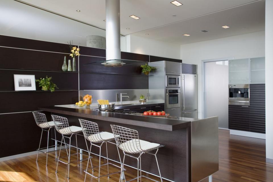 bertoia stools at counter in contemporary kitchen