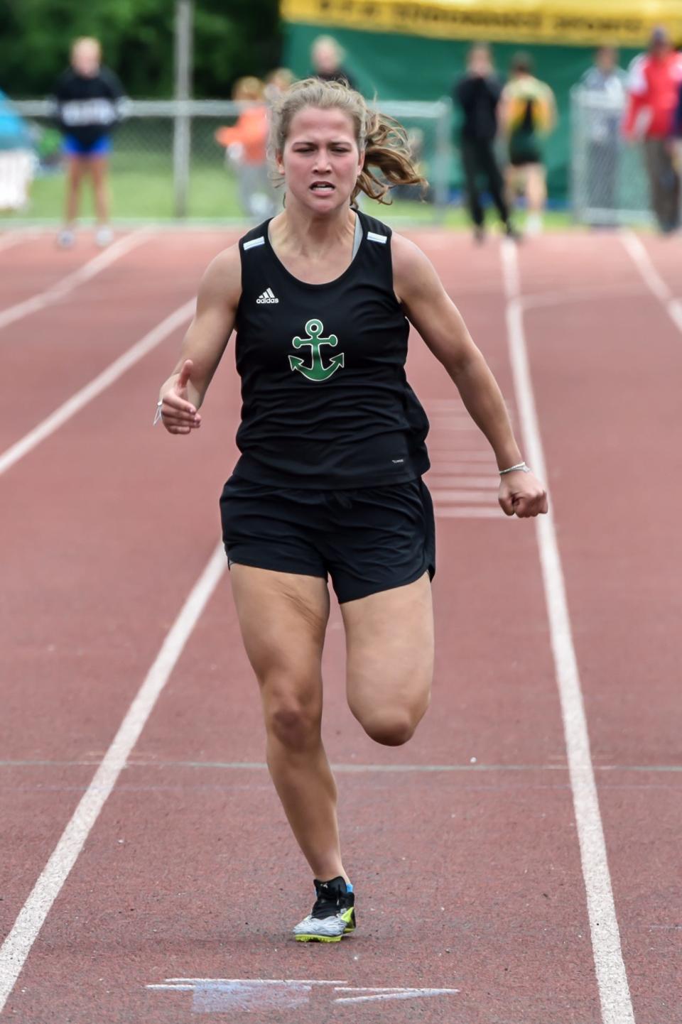 Colchester's Brinlee Gilfillan wins the girls 200 meter sprint for her second event win during the 2023 Vermont State D1 Track and Field Championships at Burlington High School.