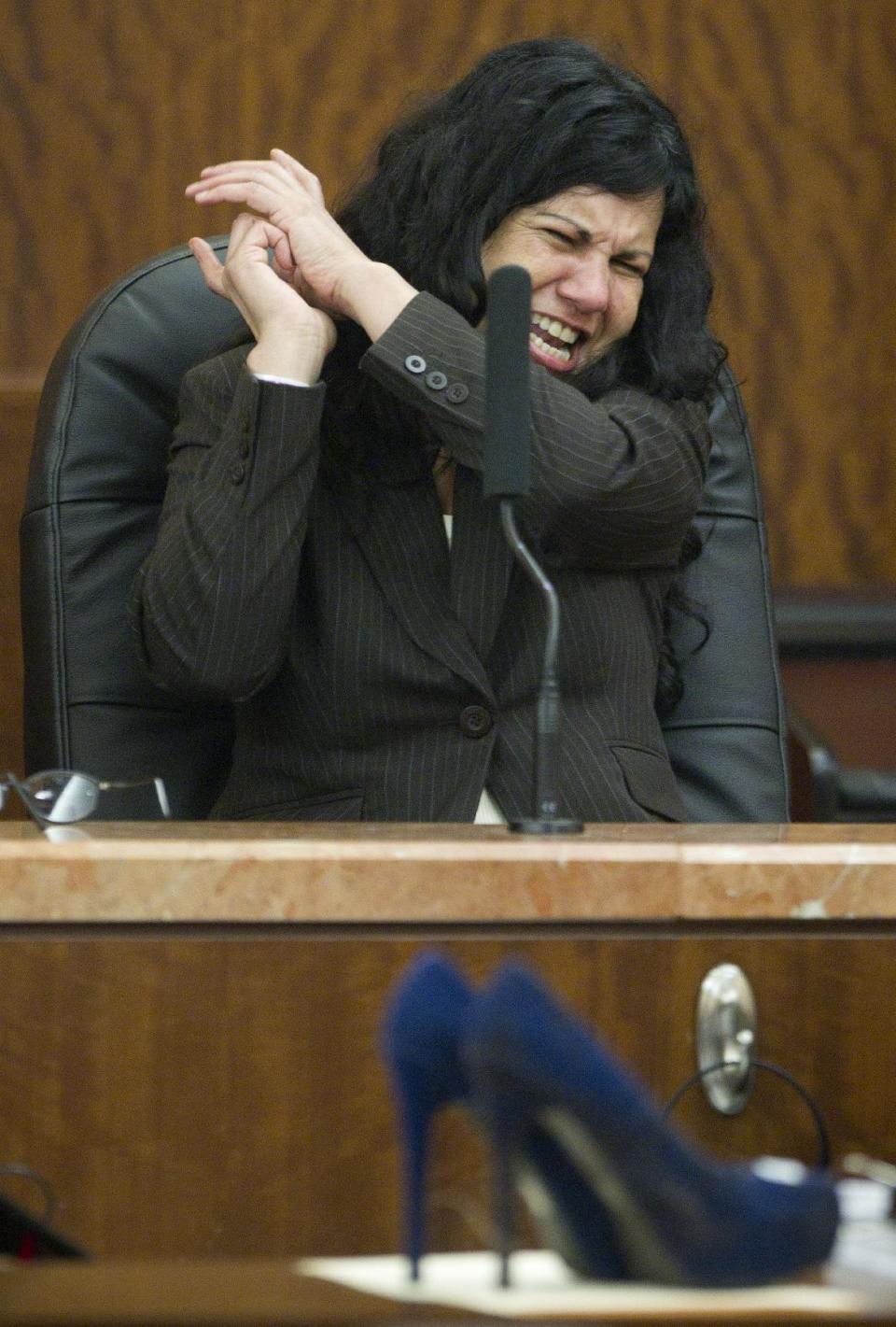 Ana Trujillo testifies during the punishment phase of her trial on Thursday, April 10, 2014, in Houston. Trujillo, convicted of murder for fatally stabbing her boyfriend 59-year-old Alf Stefan Andersson with a 5 1/2 -inch stiletto shoe heel, told the jurors she killed him in a desperate attempt to save her own life during a brutal fight of more than an hour in which she was chased down, knocked into a wall and thrown over a couch. (AP Photo/Houston Chronicle, Brett Coomer) MANDATORY CREDIT