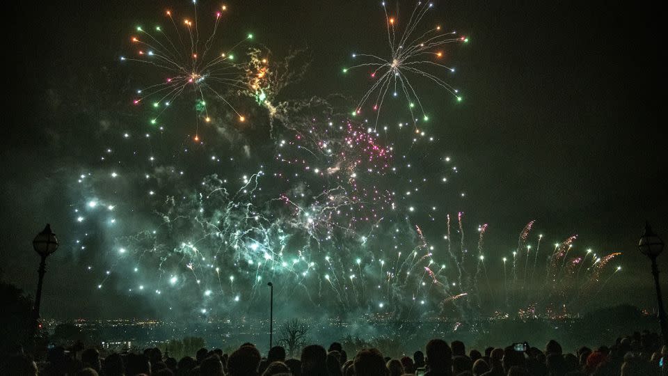 Crowds watching a firework display as part of Guy Fawkes Night celebrations at Alexandra Palace in London in 2021. - Chris J Ratcliffe/Getty Images