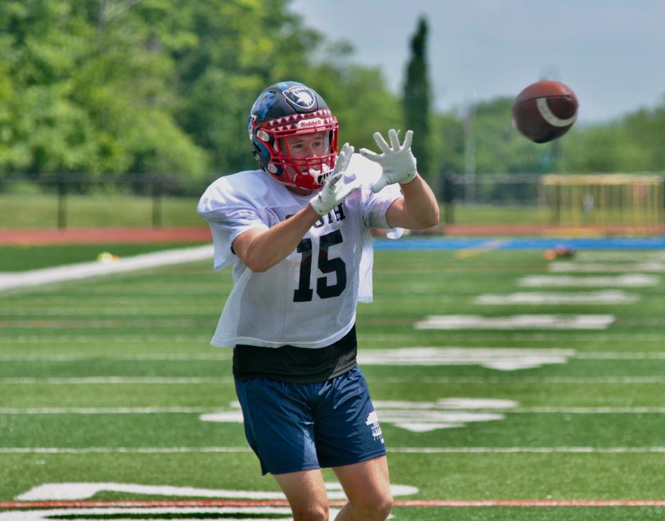South Team wide receiver Jackson Byer looks in a pass during a offensive drill at Ken Lantzy Finest 40 All-Star Classic practice, Monday, at Richland High School.