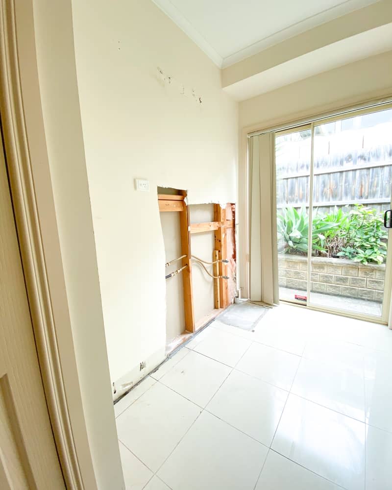 White empty laundry room during renovation