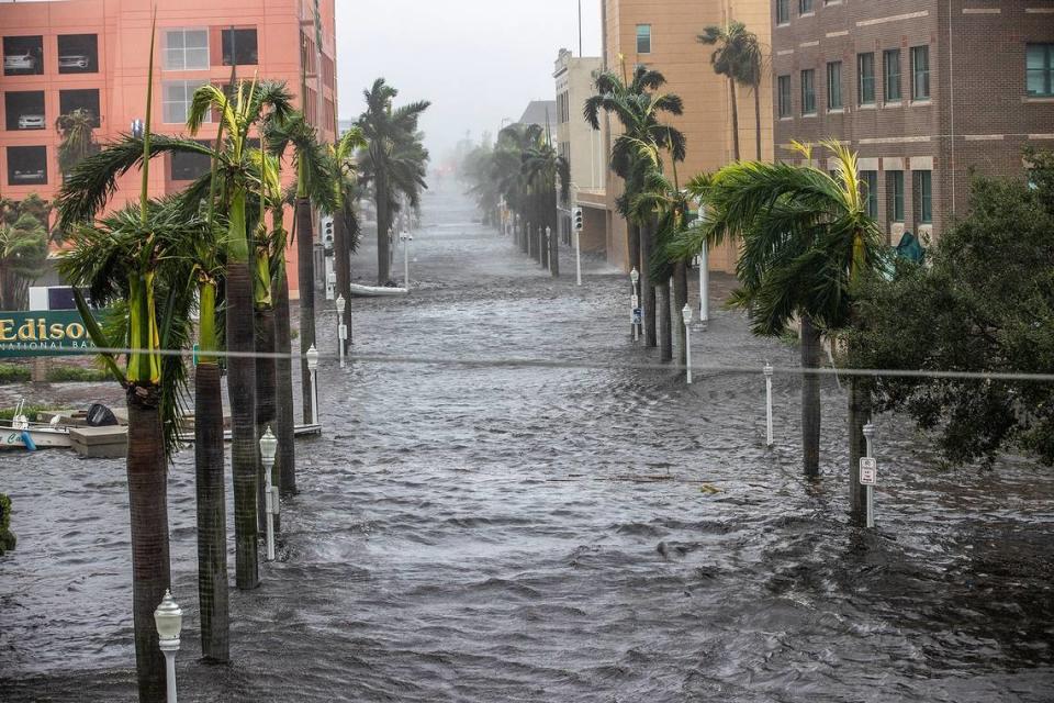 Streets of downtown Fort Myers get flooded due to the surge of the Caloosahatchee River as Hurricane Ian hits the west coast of Florida as a Category 4 storm on Wednesday, Sept. 28, 2022.