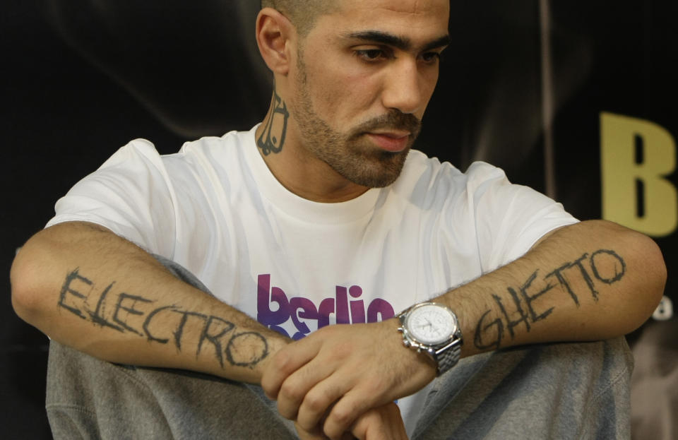 German Tunisian musician Bushido pauses during the presentation of his new book 'Bushido' at the Frankfurt book fair October 18, 2008. REUTERS/Alex Grimm (GERMANY)