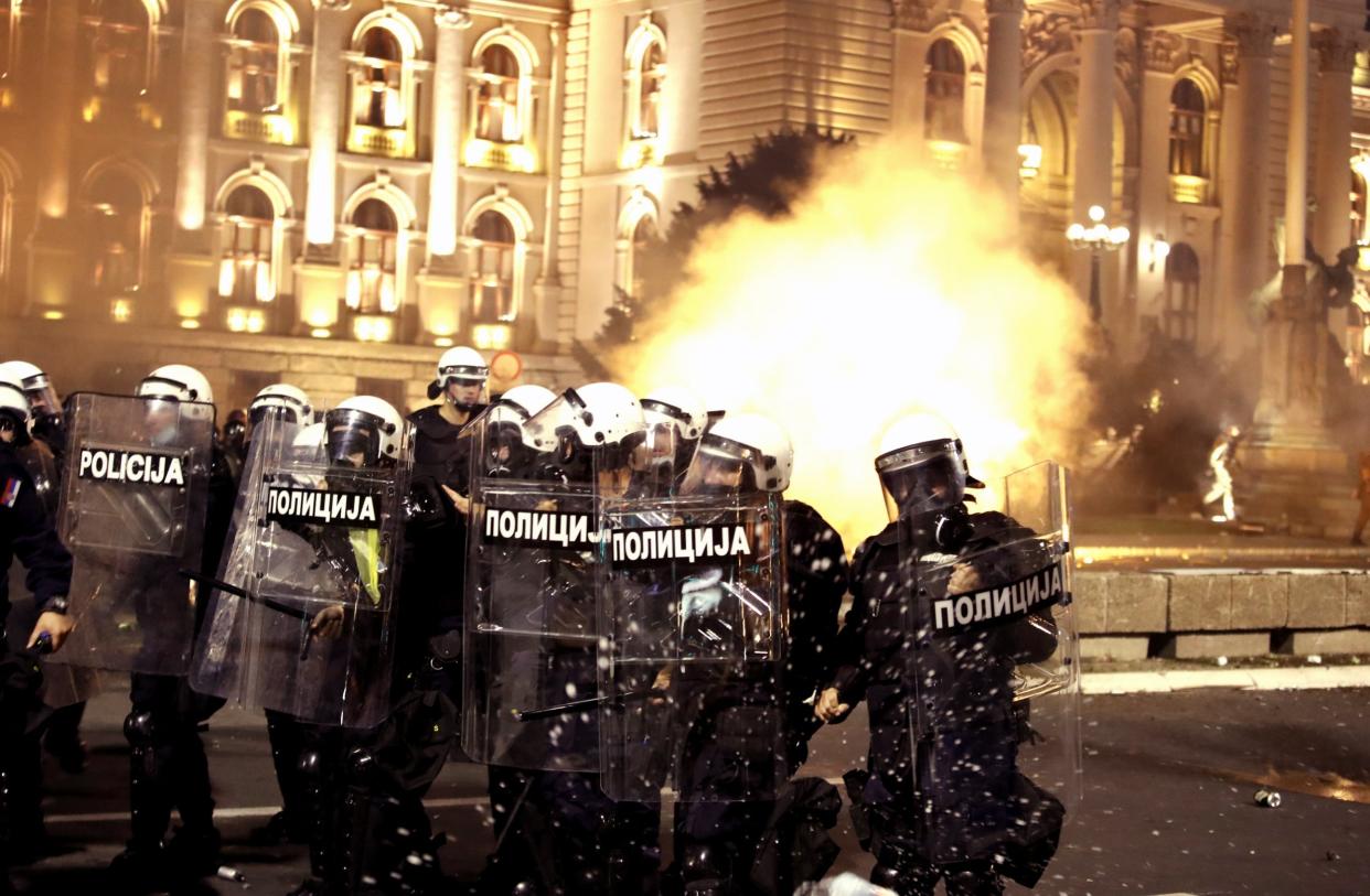 Police clash with protesters outside the Serbian parliament: EPA