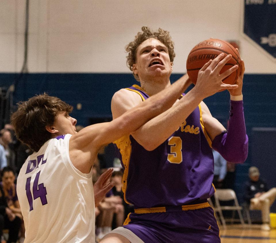 St. Rose's Matt Hodge battles with Rumson-Fair Haven's Theo Carlston during a Shore Conference Tournament quarterfinal game on Feb. 10, 2024 in Middletown, N.J.