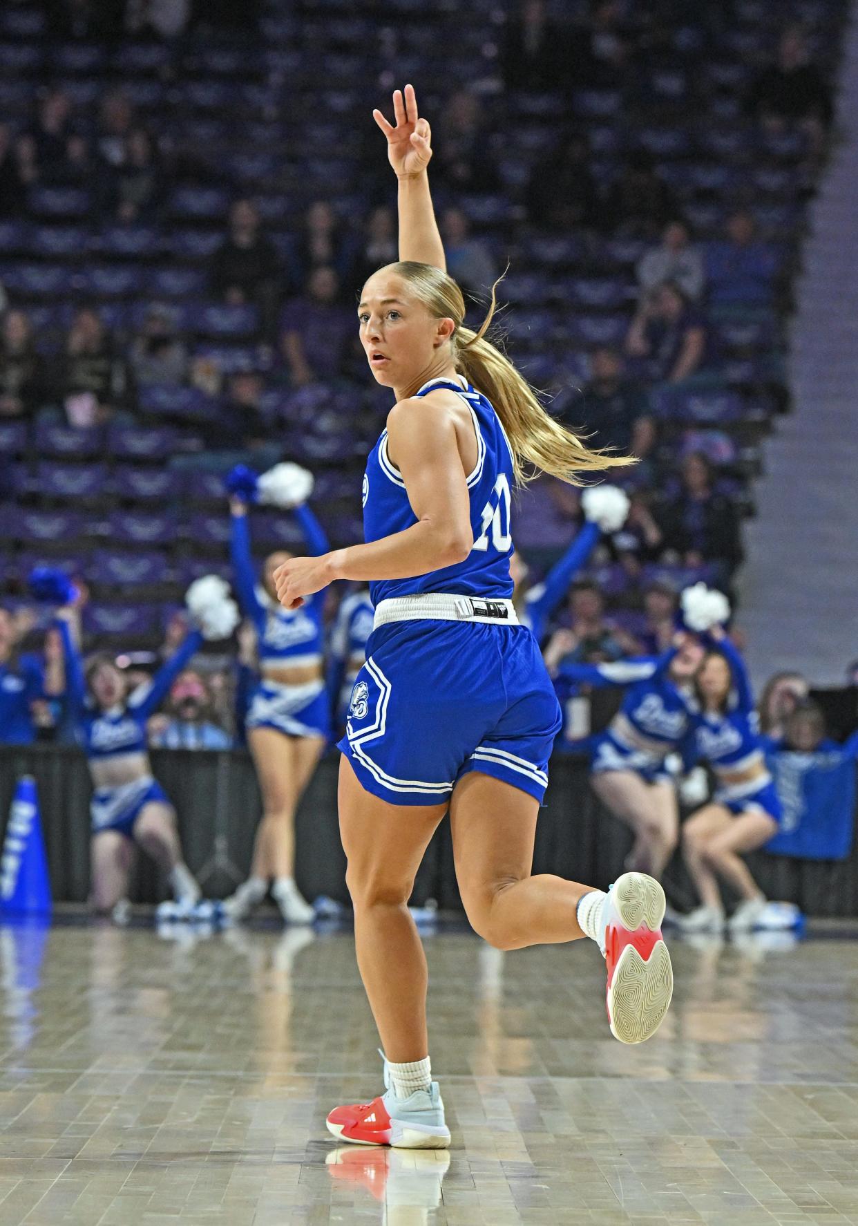 Katie Dinnebier and the Drake women's basketball team captured the Missouri Valley Conference regular-season and conference championships.