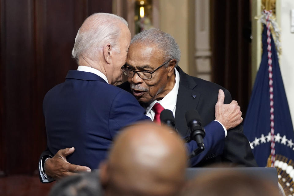 President Joe Biden hugs Rev. Wheeler Parker, Jr., at an event to establish the Emmett Till and Mamie Till-Mobley National Monument, in the Indian Treaty Room in the Eisenhower Executive Office Building on the White House campus, Tuesday, July 25, 2023, in Washington. (AP Photo/Evan Vucci)
