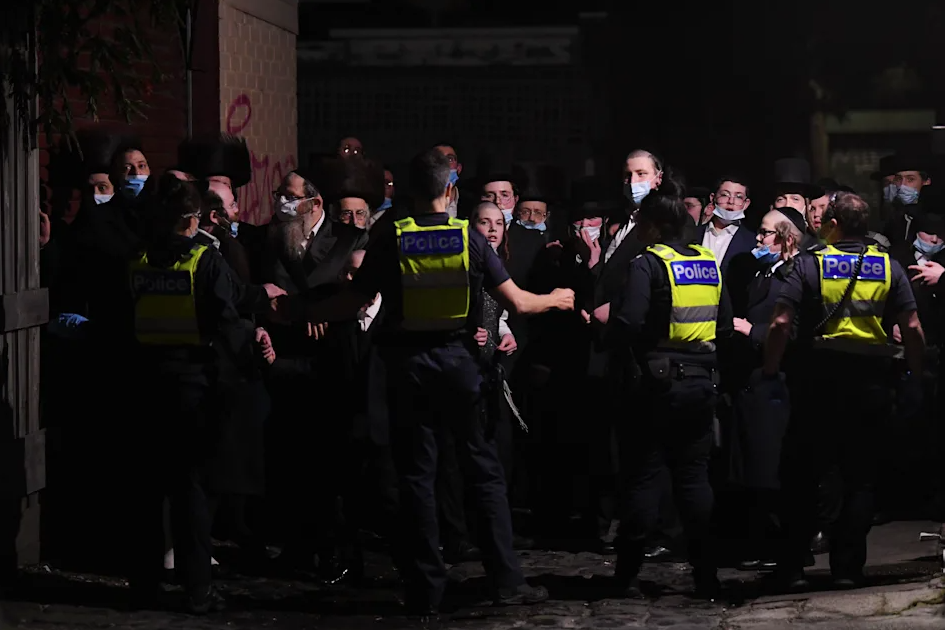 Victoria Police field worshippers at Ripponlea synagogue in Melbourne on Tuesday night after an illegal gathering.