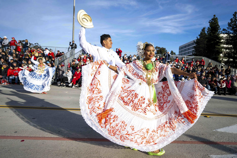 Banda de Música La Primavera, of Panama, dance along Colorado Boulevard during the 134th Rose Parade in Pasadena, Calif., Monday, Jan. 2, 2023. (Sarah Reingewirtz/The Orange County Register via AP)