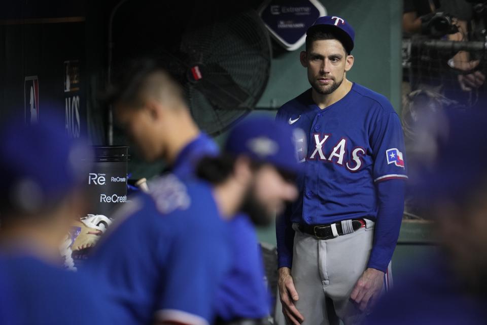 Texas Rangers starting pitcher Nathan Eovaldi reacts after being pulled during the seventh inning of Game 6 of the baseball AL Championship Series against the Houston Astros Sunday, Oct. 22, 2023, in Houston. (AP Photo/Godofredo A. Vásquez)