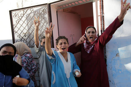 Civilians shout slogans during a demonstration against alleged corruption in the town of Al-Hoceima, Morocco July 20, 2017. REUTERS/Youssef Boudlal