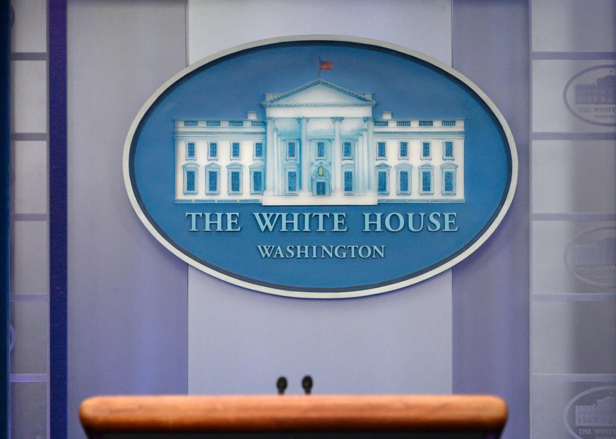 <span class="caption">The White House logo is displayed in the press briefing room of the White House in Washington, D.C. on Jan. 31, 2020. </span> <span class="attribution"><a class="link " href="https://www.gettyimages.com/detail/news-photo/the-white-house-logo-is-displayed-in-the-press-briefing-news-photo/1197857412?adppopup=true" rel="nofollow noopener" target="_blank" data-ylk="slk:Getty/Andrew Caballero-Reynolds/AFP;elm:context_link;itc:0;sec:content-canvas">Getty/Andrew Caballero-Reynolds/AFP</a></span>