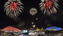 Fireworks are seen over the Olympic Park during the rehearsal of the opening ceremony at the Adler district of Sochi, February 1, 2014. Sochi will host the 2014 Winter Olympic Games from February 7 to February 23. REUTERS/Alexander Demianchuk (RUSSIA - Tags: SPORT OLYMPICS TPX IMAGES OF THE DAY)