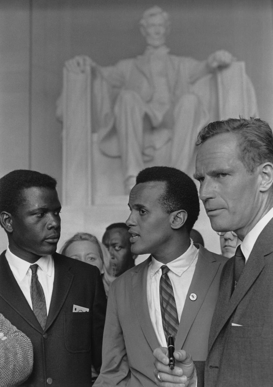 Actors Sidney Poitier, Charlton Heston and singer Harry Belafonte at the 1963 Civil Rights March on Washington. Aug. 28, 1963.<span class="copyright">Courtesy Everett Collection</span>