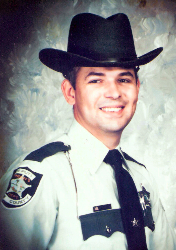 Polk County Sheriff's Deputy Theron Burnham, 27, was killed in January 1981 by Paul Beasley Johnson, the same night Johnson killed two others in a drug-fueled crime binge. Johnson spend four decades on death row but died Saturday at age 74.