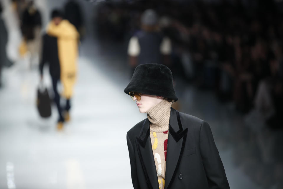 A model wears a creation as part of the Fendi men's Fall-Winter 2020/21 collection, that was presented in Milan, Italy, Monday, Jan. 13, 2020. (AP Photo/Antonio Calanni)