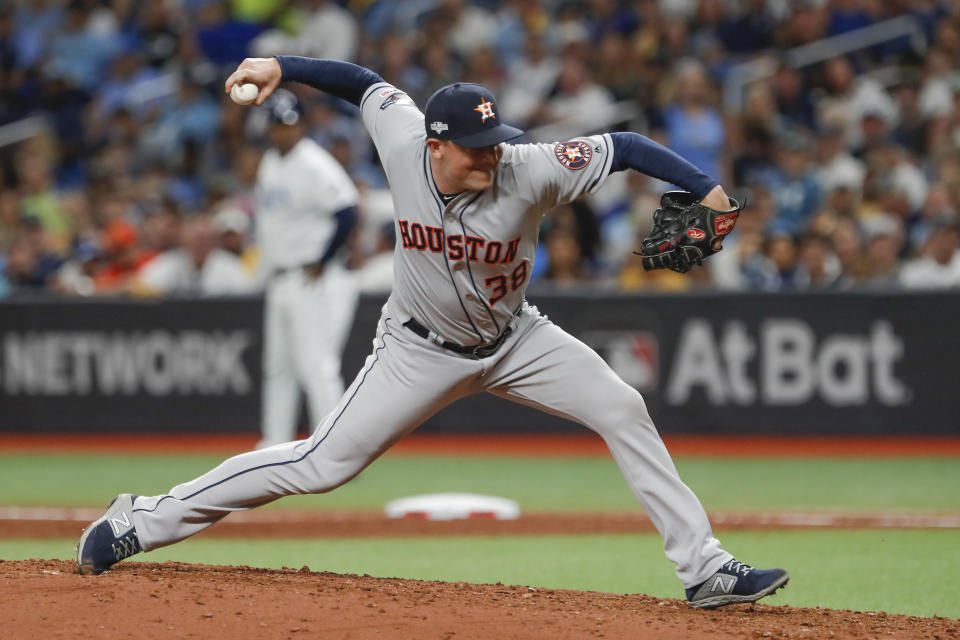 Houston Astros' Joe Smith pitches to a Tampa Bay Rays batter during the seventh inning of Game 4 of a baseball American League Division Series, Tuesday, Oct. 8, 2019, in St. Petersburg, Fla. (AP Photo/Scott Audette)