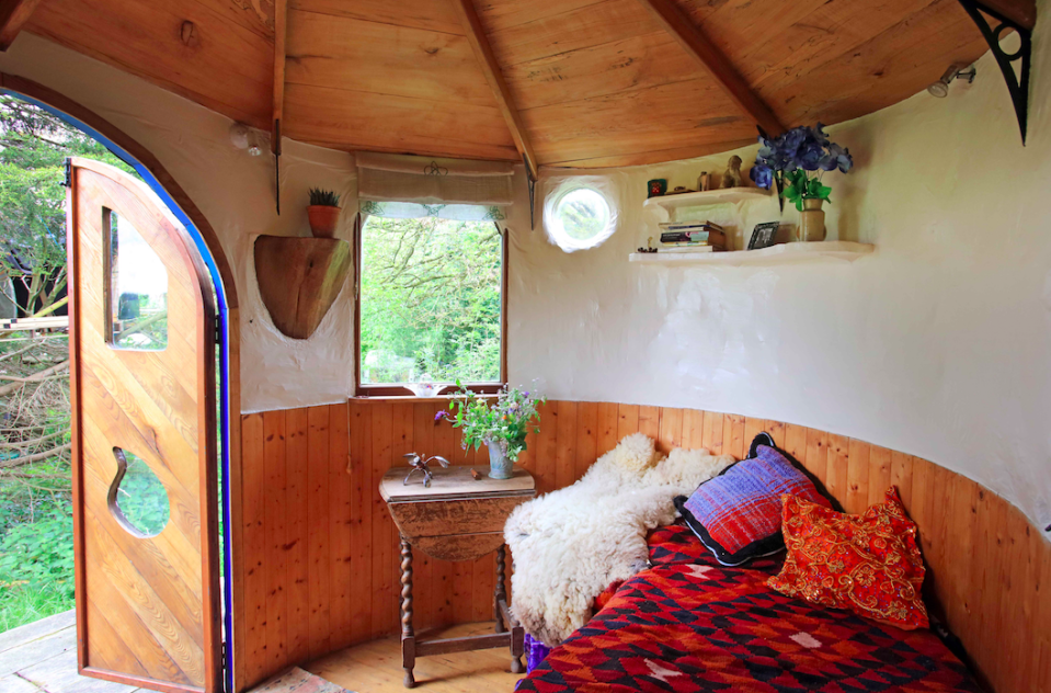 The Love Shack is clad with tiles made from reclaimed tractor inner tubes, and has a living roof. (Pic: Supplied)