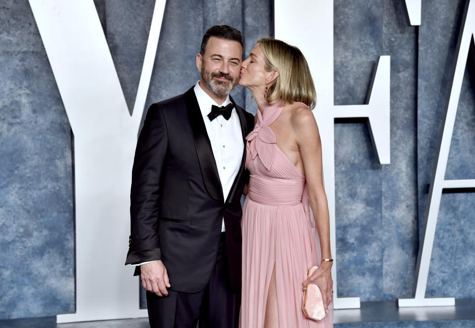 Jimmy Kimmel, left, and Molly McNearney arrive at the Vanity Fair Oscar Party on Sunday, March 12, 2023, at the Wallis Annenberg Center for the Performing Arts in Beverly Hills, Calif. (Photo by Evan Agostini/Invision/AP)