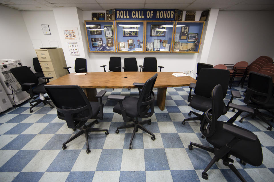 This Friday, Oct. 26, 2018, photo shows a conference room used as an overflow juvenile holding area in the event of mass arrest at Police 9th District in Philadelphia. Bloomberg Philanthropies announced the winners Monday of the U.S. Mayors Challenge that asked cities to develop innovative solutions to their biggest problems that other cities could copy. Philadelphia plans to build a juvenile justice hub designed to make contact with police less traumatic, keep more children out of the criminal justice system and connect at-risk juveniles with intervention services at a crisis point that could change their lives. (AP Photo/Matt Rourke)